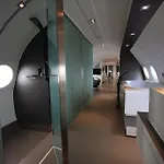 Отель Vliegtuigsuite Тёге